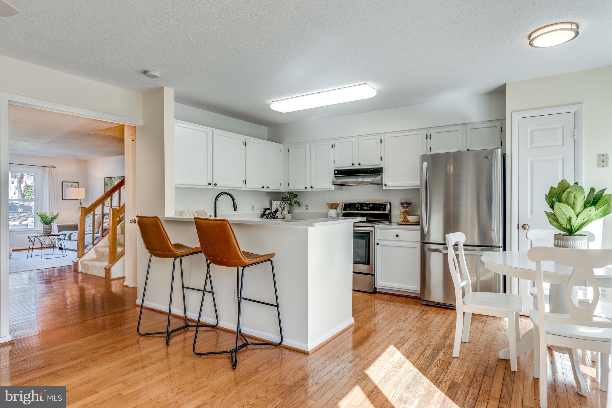 1650 Oak Spring Way Reston, VA 20190 - Photo 12 of 45 Large Open kitchen with Quartz Counters