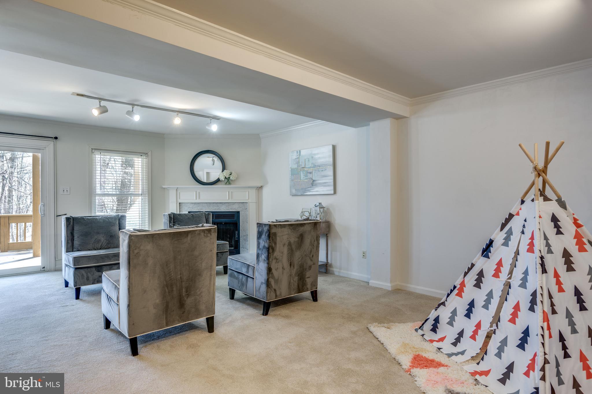 1650 Oak Spring Way Reston, VA 20190 - Photo 33 of 45 Wood burning Fireplace! Overlooking rear yard