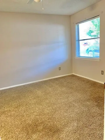 an empty room with window