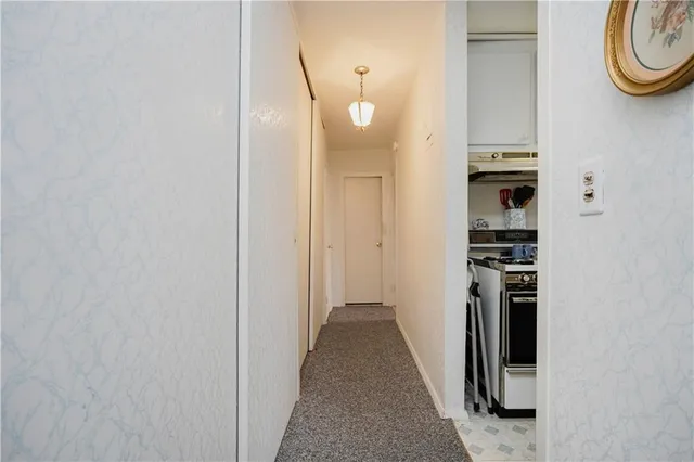 a view of a storage & utility room with washer and dryer