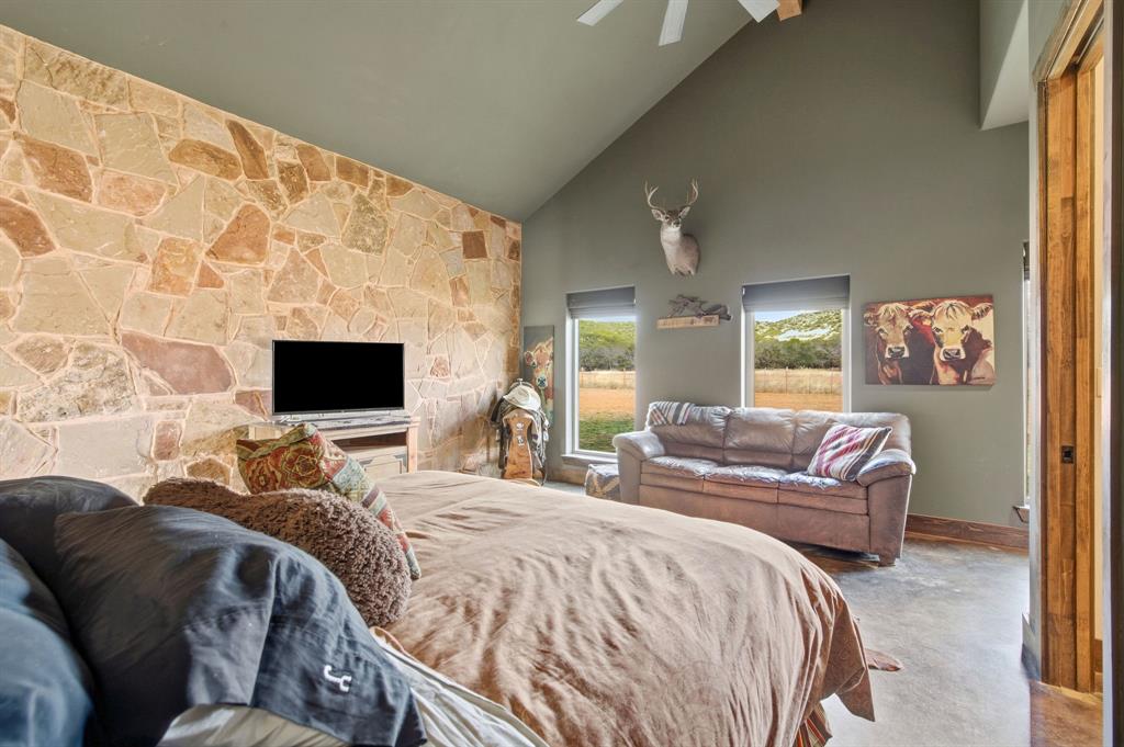 650 Fm 2035 Merkel, TX 79536 - Photo 23 of 40 a bedroom with a bed and a television