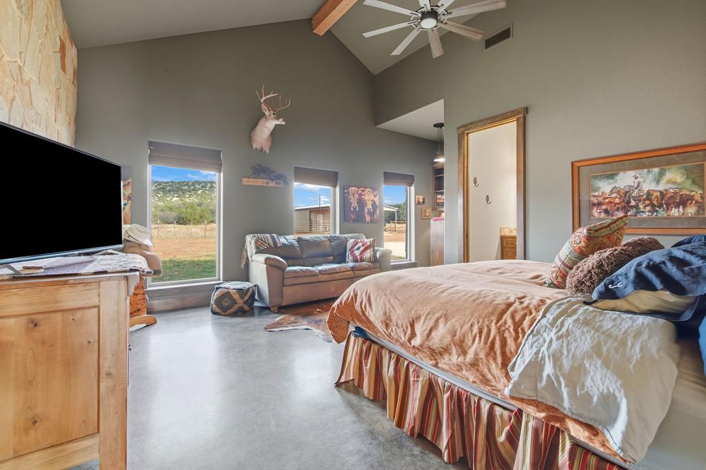 650 Fm 2035 Merkel, TX 79536 - Photo 24 of 40 a bedroom with furniture and a flat screen tv