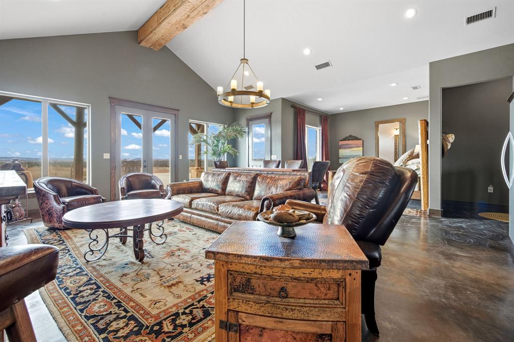650 Fm 2035 Merkel, TX 79536 - Photo 31 of 40 a living room with furniture a chandelier and a chandelier