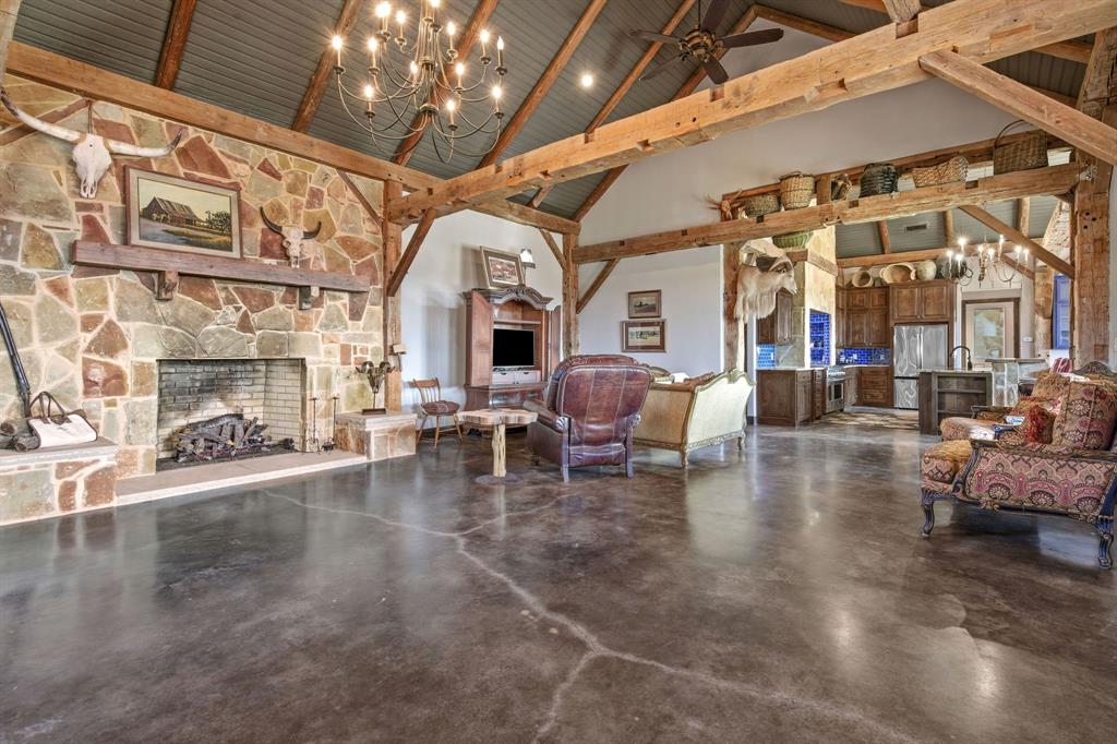 650 Fm 2035 Merkel, TX 79536 - Photo 6 of 40 a living room with fireplace furniture and a large window