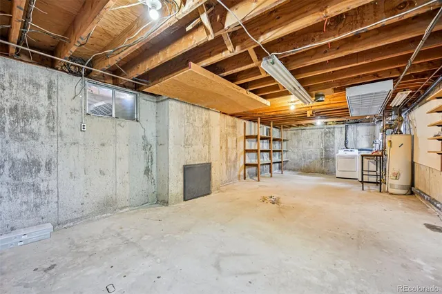 a view of empty room with wooden ceiling