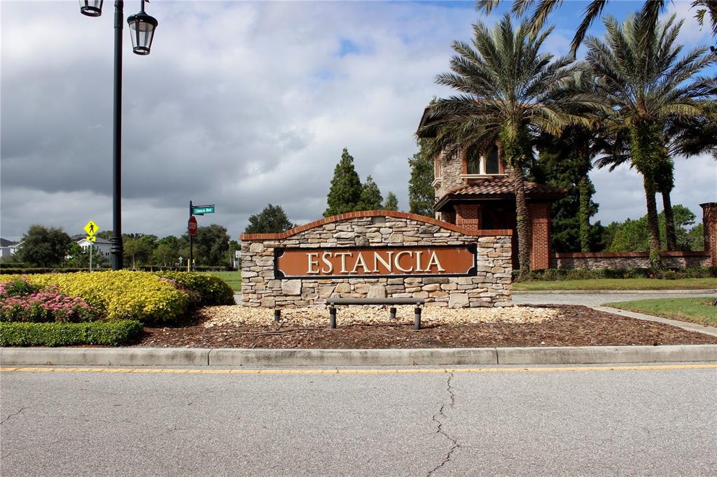 4596 Almada Lane Wesley Chapel, FL 33543 - Photo 19 of 56 a sign that is on the side of a road