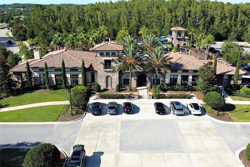4596 Almada Lane Wesley Chapel, FL 33543 - Photo 51 of 56 a front view of a house with yard and patio