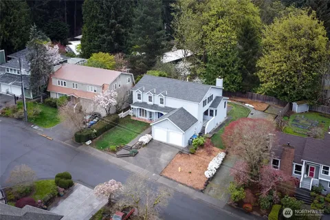 an aerial view of a house with a garden