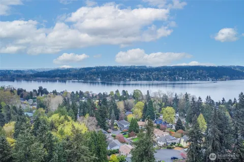 a view of a lake with a house in the background