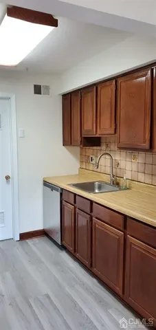 a kitchen with a sink and a cabinets