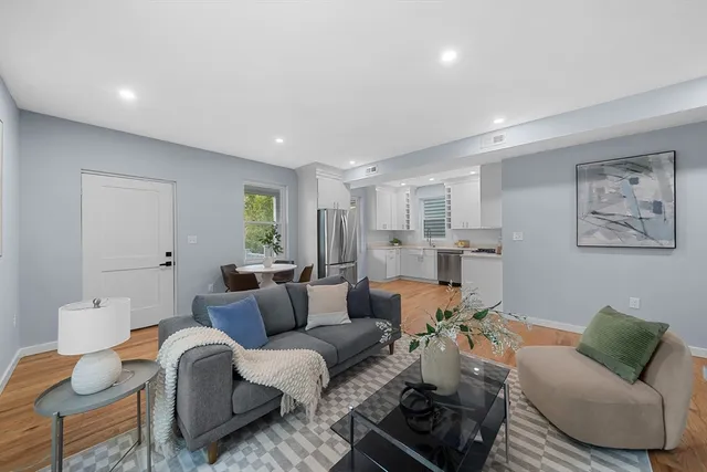 a living room with furniture and a couch