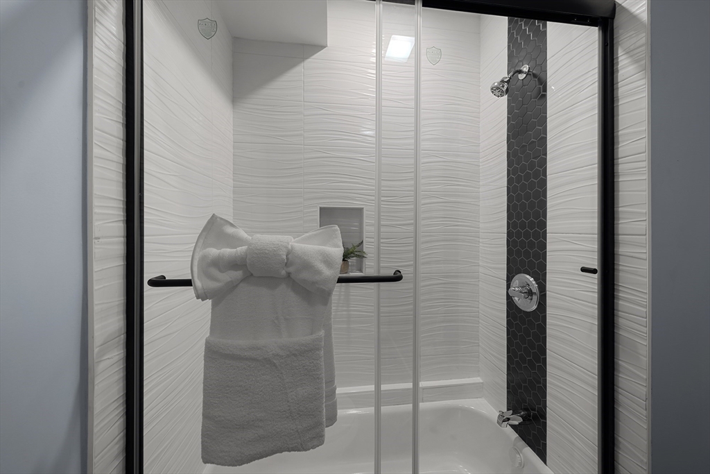 175 Howard Avenue, Unit 2 Boston, MA 02125 - Photo 18 of 26 a bathroom with a shower