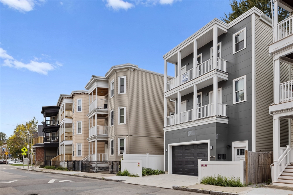 175 Howard Avenue, Unit 2 Boston, MA 02125 - Photo 25 of 26 a front view of a multi story building