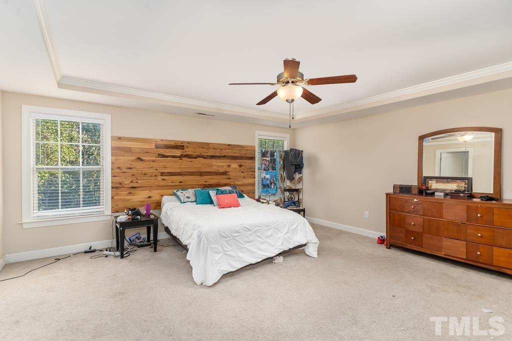 40 Cromwell Circle Cameron, NC 28326 - Photo 21 of 23 a bedroom with a bed and a window