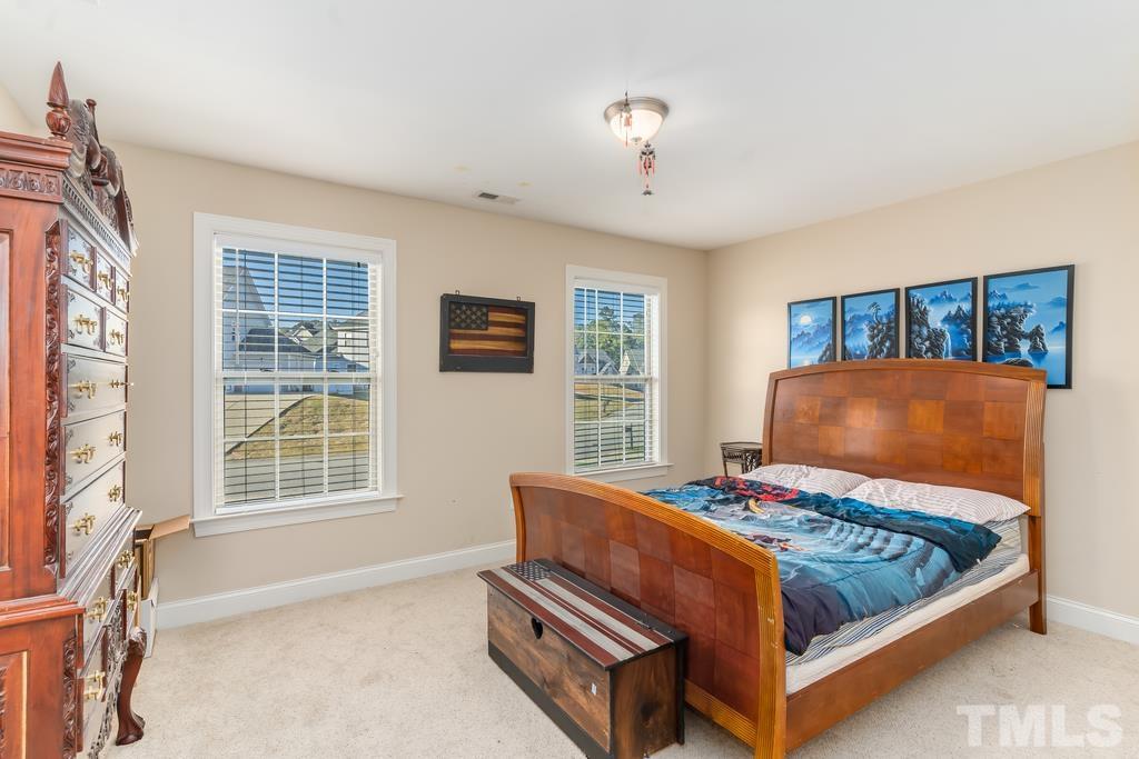 40 Cromwell Circle Cameron, NC 28326 - Photo 23 of 23 a bedroom with a bed and a window