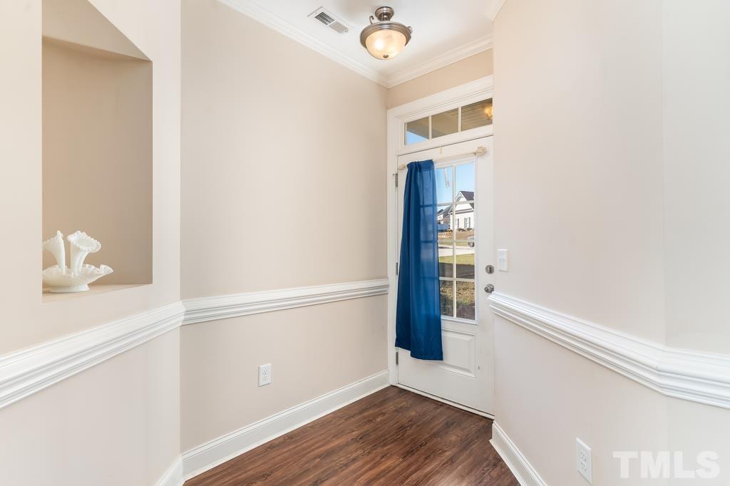 40 Cromwell Circle Cameron, NC 28326 - Photo 6 of 23 a view of an entryway with wooden floor