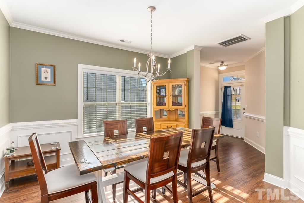 40 Cromwell Circle Cameron, NC 28326 - Photo 9 of 23 a view of a dining room with furniture window and wooden floor