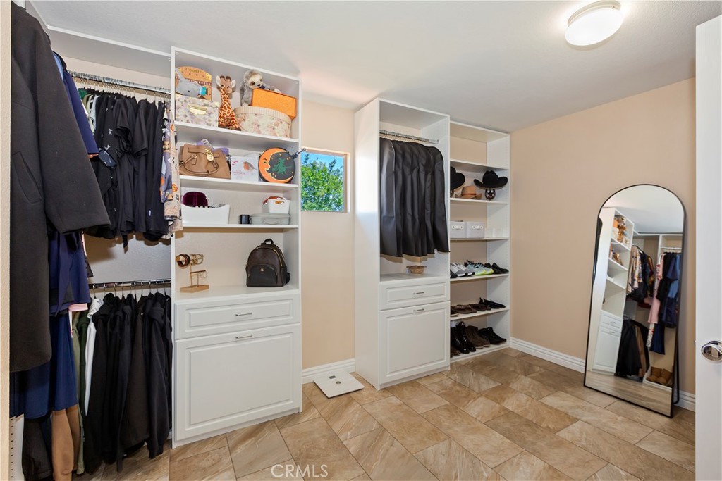 9609 Heartland Place Rancho Cucamonga, CA 91730 - Photo 31 of 48 Primary Suite Walk-in closet