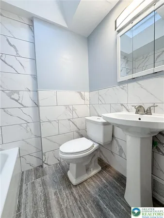 a bathroom with a bathtub