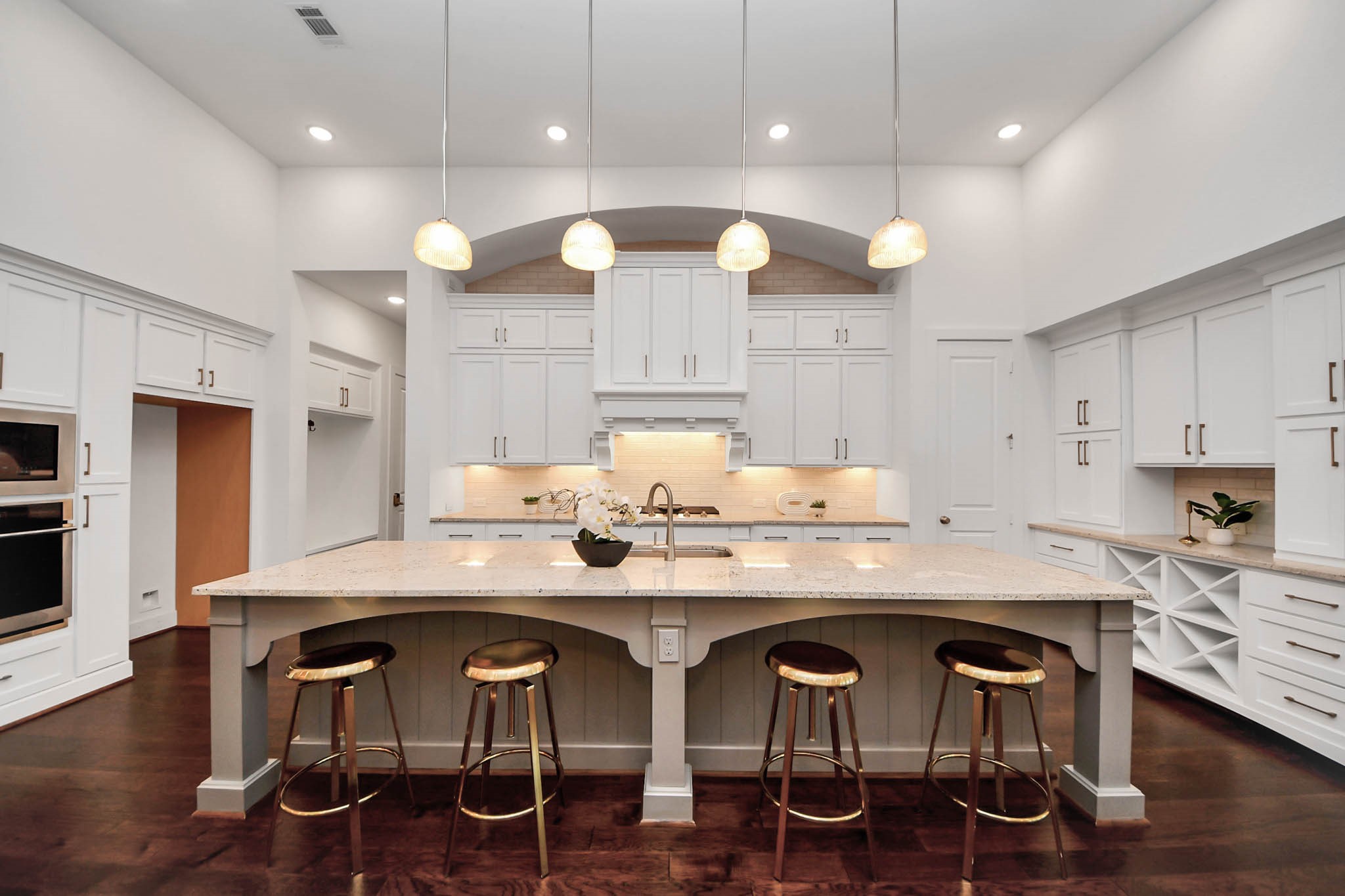 4310 Bakers Cove Manvel, TX 77578 - Photo 15 of 47 Incredible kitchen with large island with bar seating, pendant lighting, walk-in pantry, and hutch storage