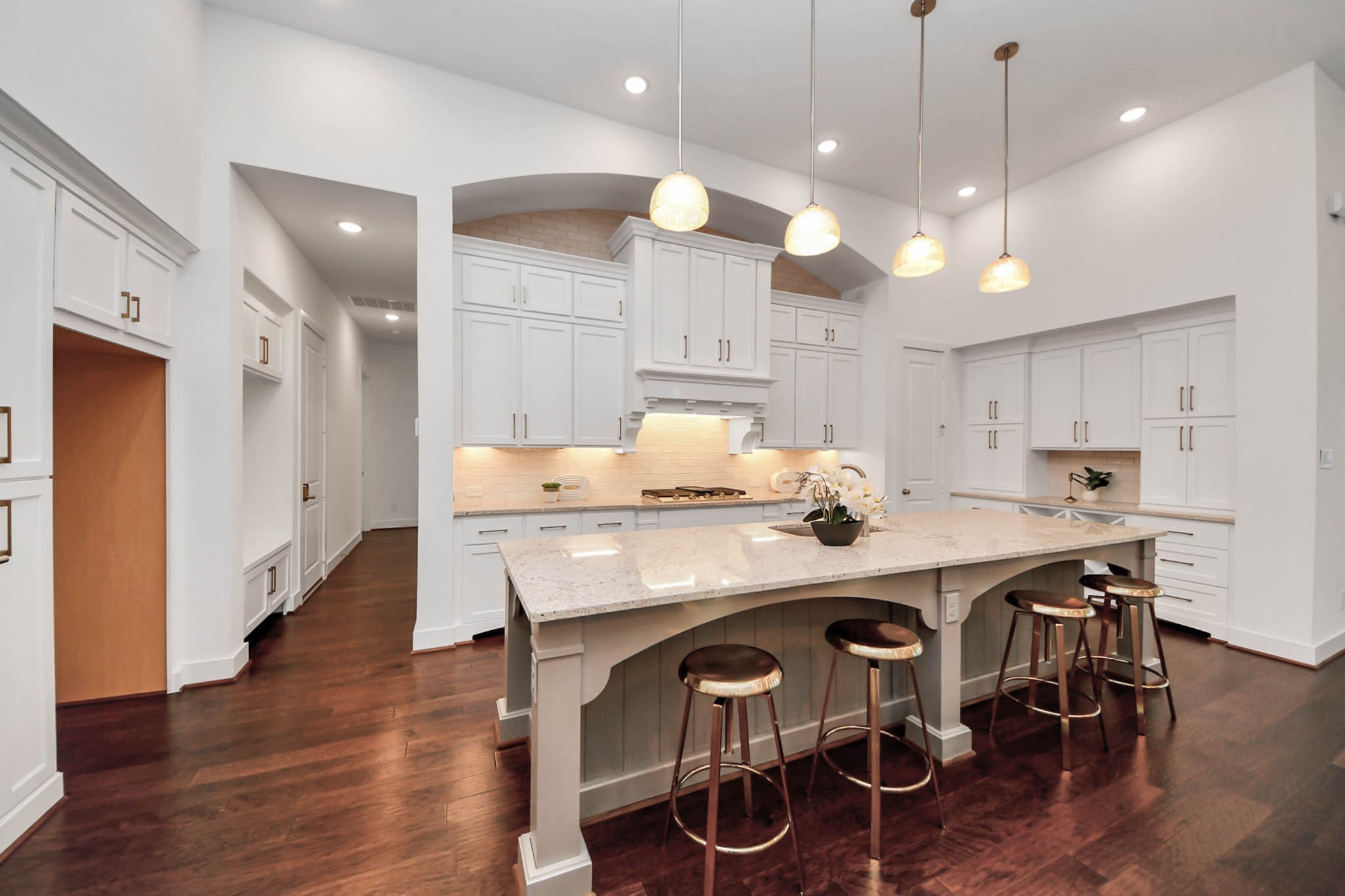 4310 Bakers Cove Manvel, TX 77578 - Photo 16 of 47 Incredible kitchen with large island with bar seating, pendant lighting, walk-in pantry, and hutch storage