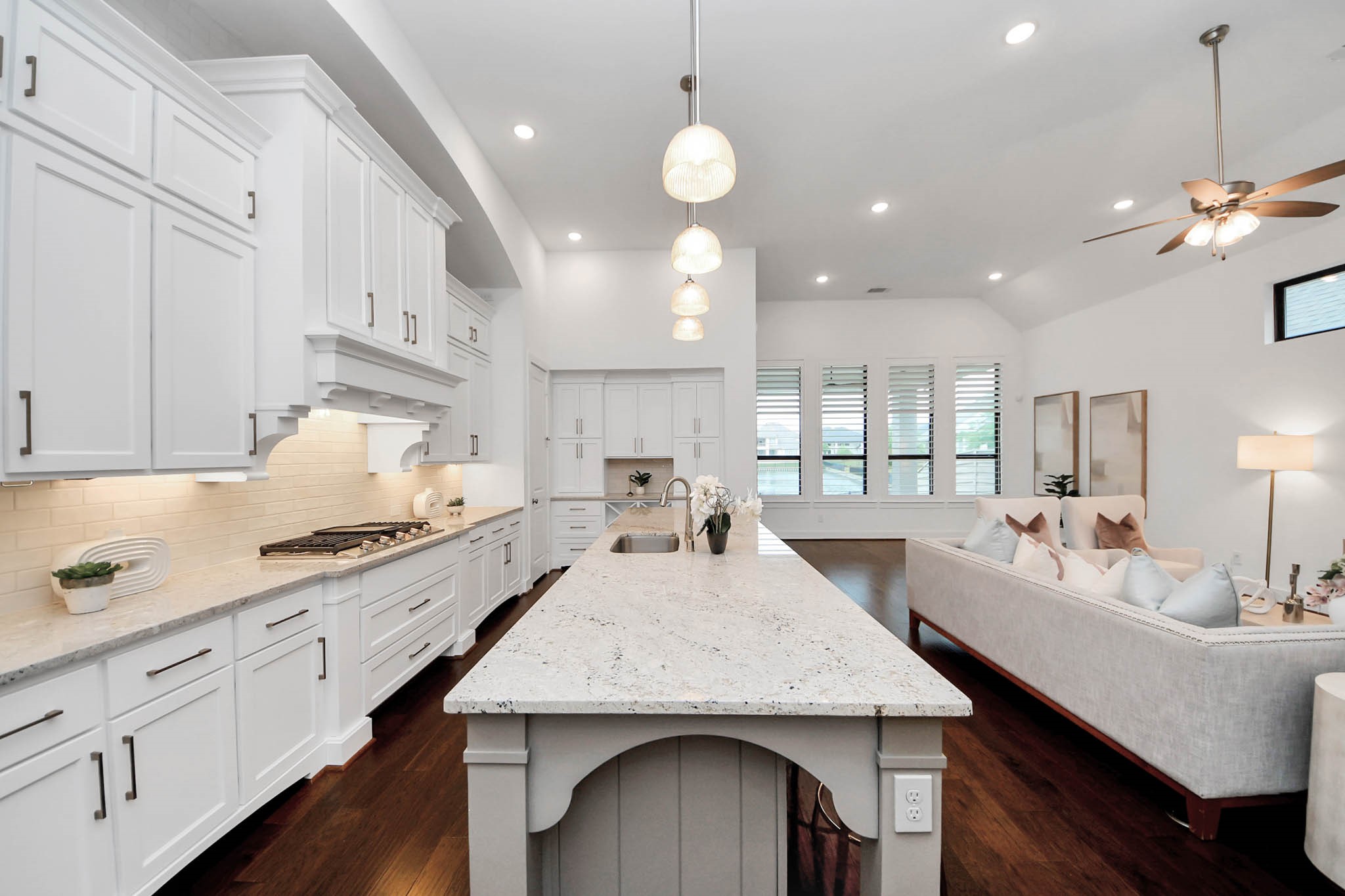 4310 Bakers Cove Manvel, TX 77578 - Photo 17 of 47 Hidden under the cabinets are two pull-down magnetic knife storage systems
