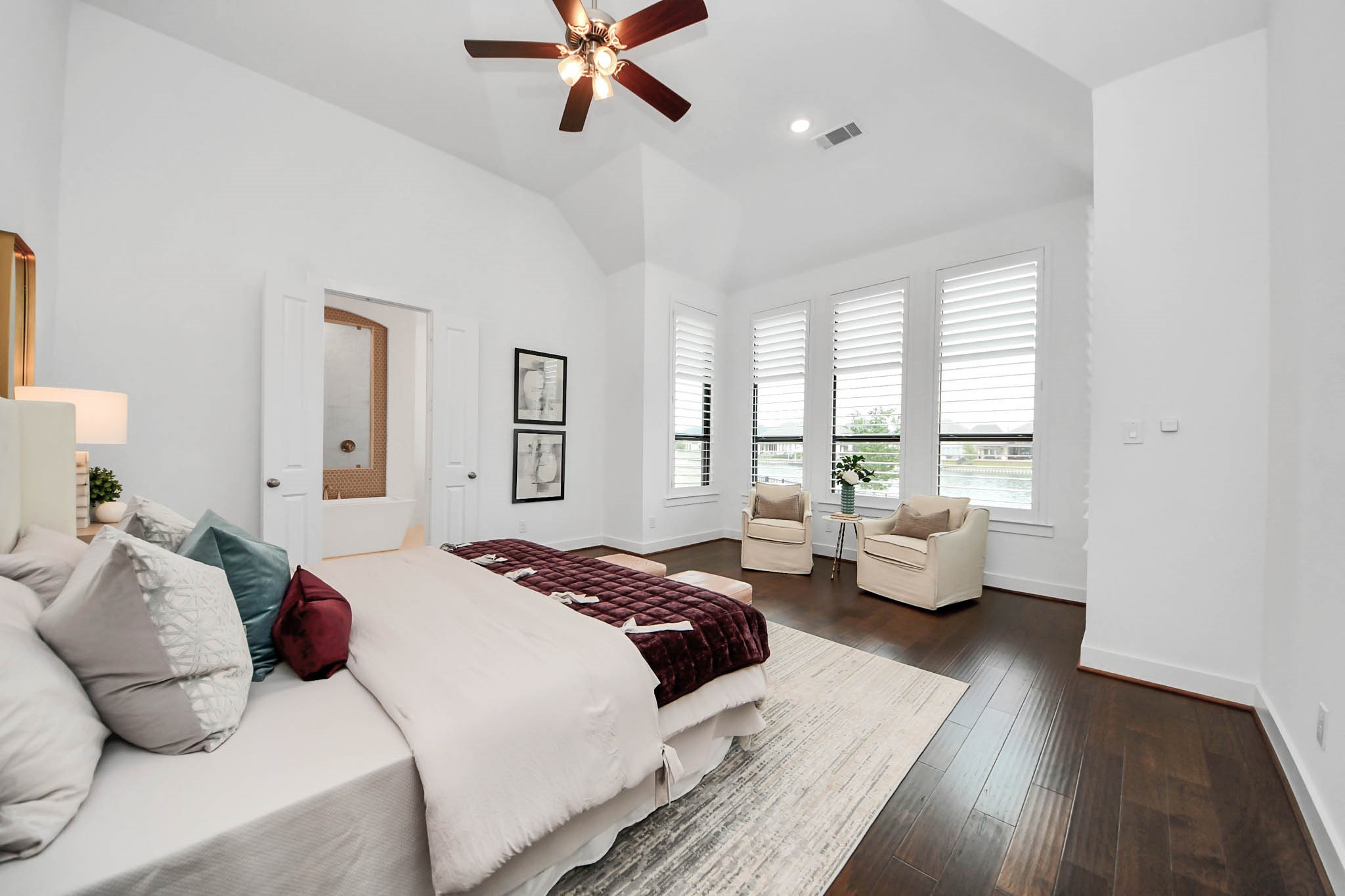 4310 Bakers Cove Manvel, TX 77578 - Photo 21 of 47 The primary bedroom has a beautiful view of the lake