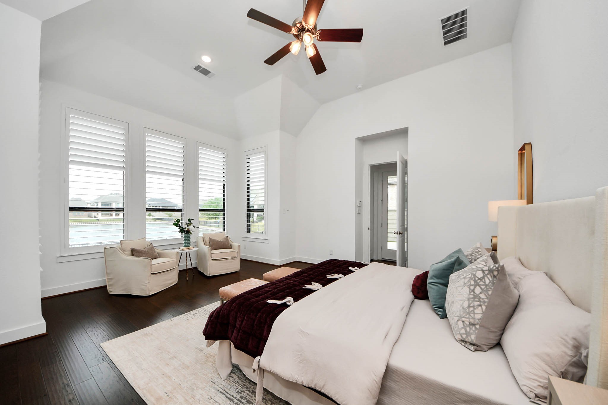 4310 Bakers Cove Manvel, TX 77578 - Photo 23 of 47 The primary bedroom has a beautiful view of the lake