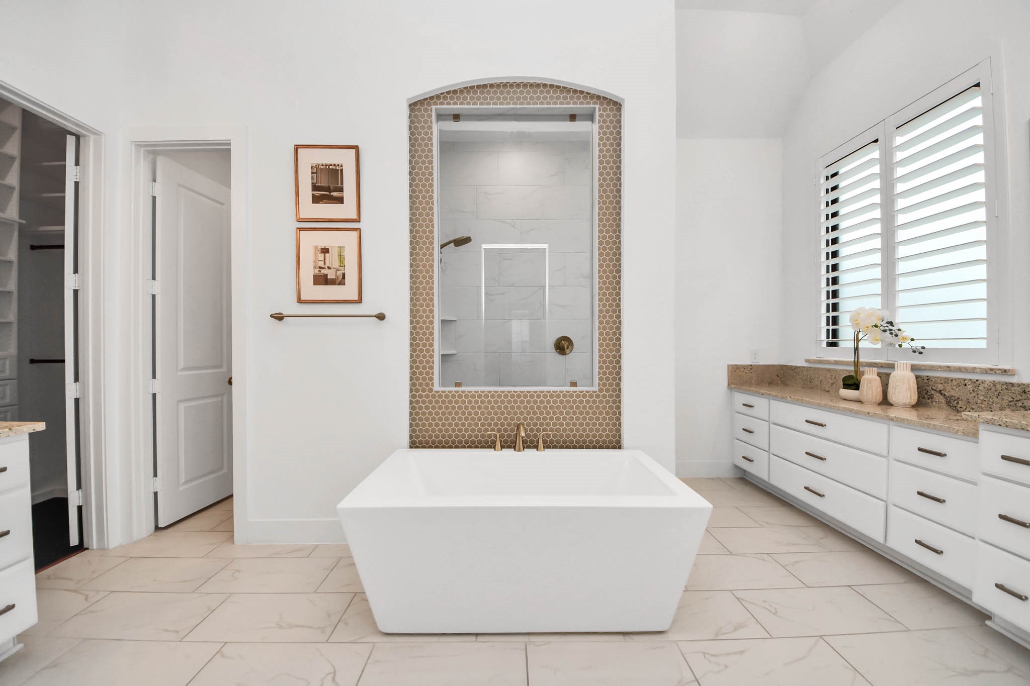 4310 Bakers Cove Manvel, TX 77578 - Photo 25 of 47 Free-standing soaking tub in primary bath with a peek-a-boo shower