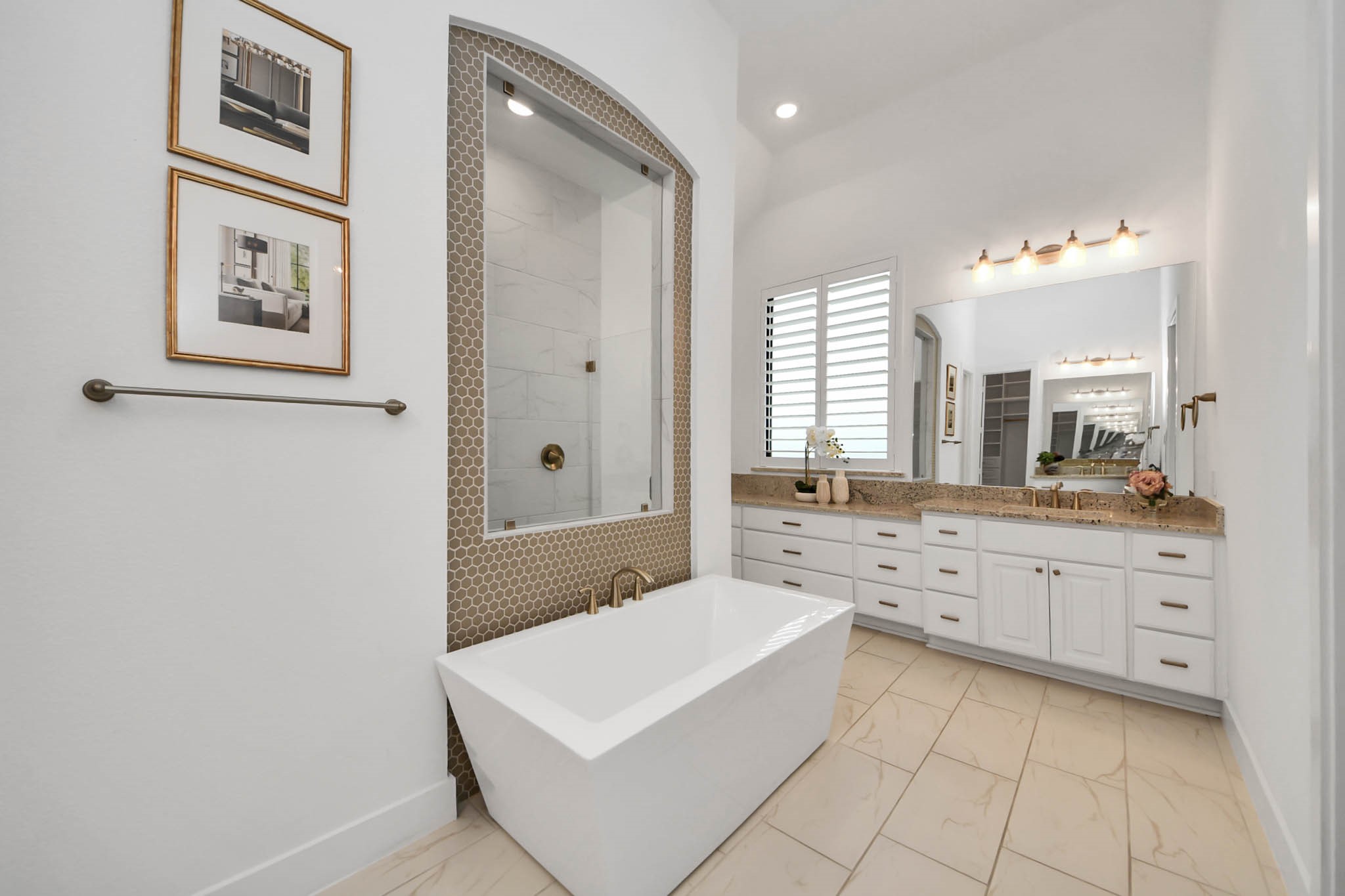 4310 Bakers Cove Manvel, TX 77578 - Photo 27 of 47 An integrated electrical outlet is located in the middle right side drawer for tidy storage of hot tools.