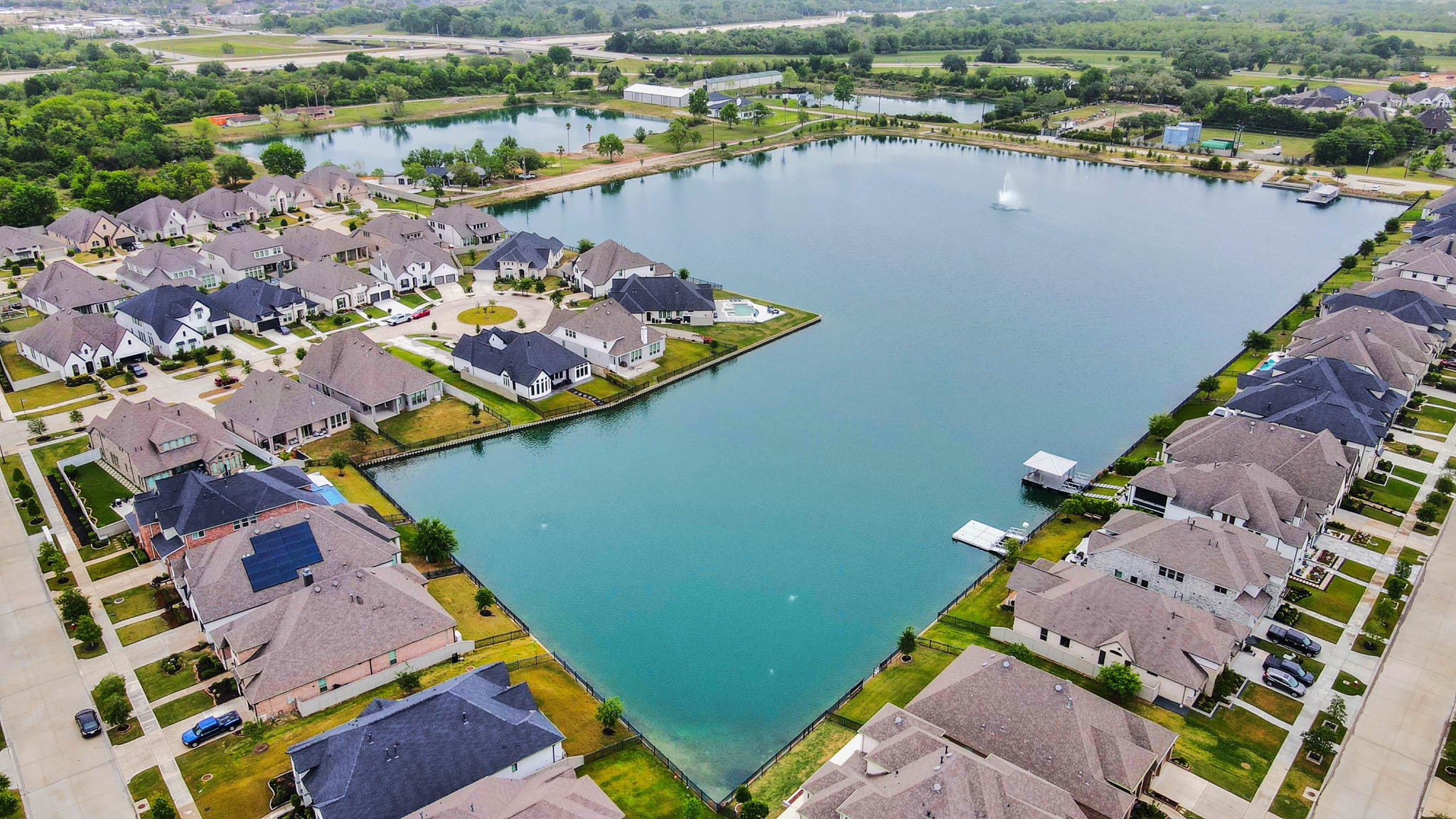 4310 Bakers Cove Manvel, TX 77578 - Photo 44 of 47 Pomona's "The Dock" offers residents kayaks, canoes, paddleboarding and swimming in the sport lake