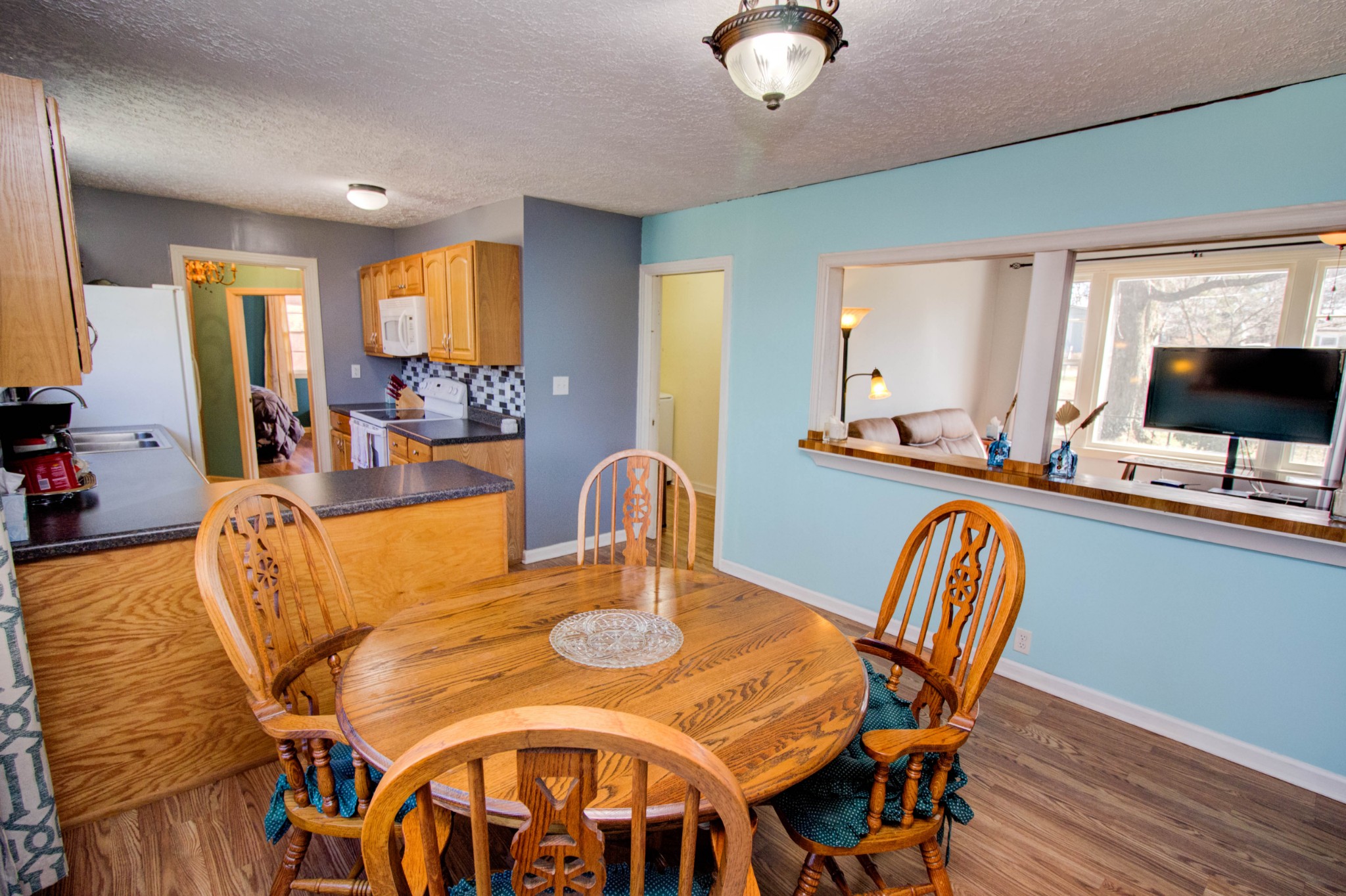 1409 5th Avenue West Springfield, TN 37172 - Photo 12 of 41 a view of a a dining room with furniture window and wooden floor