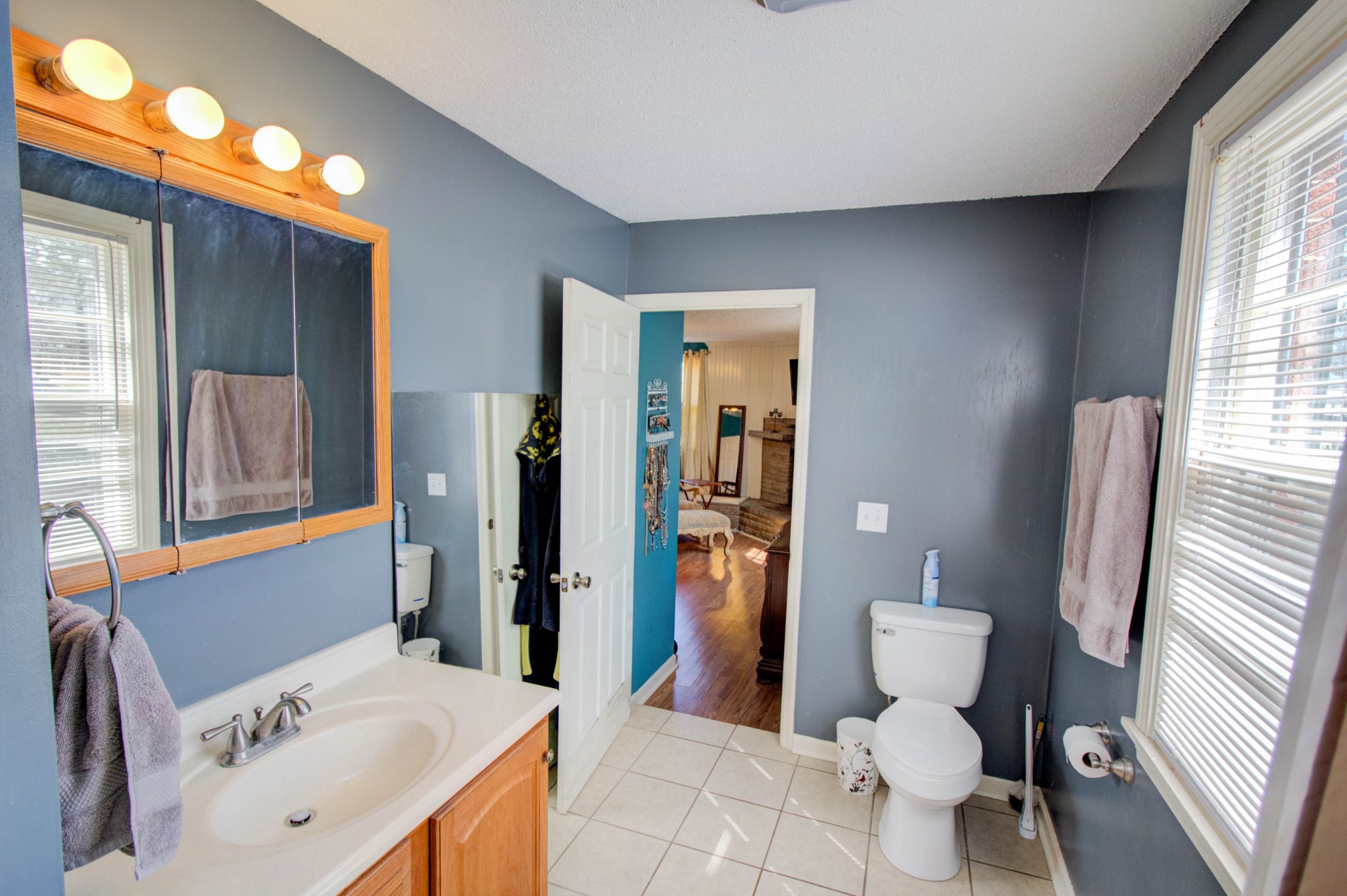 1409 5th Avenue West Springfield, TN 37172 - Photo 28 of 41 a bathroom with a sink toilet and shower