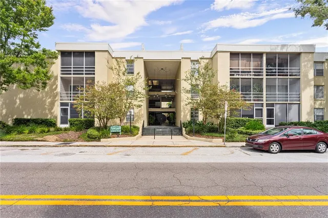 a car parked in front of a house