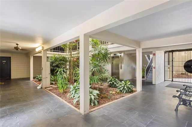a view of a porch with seating space