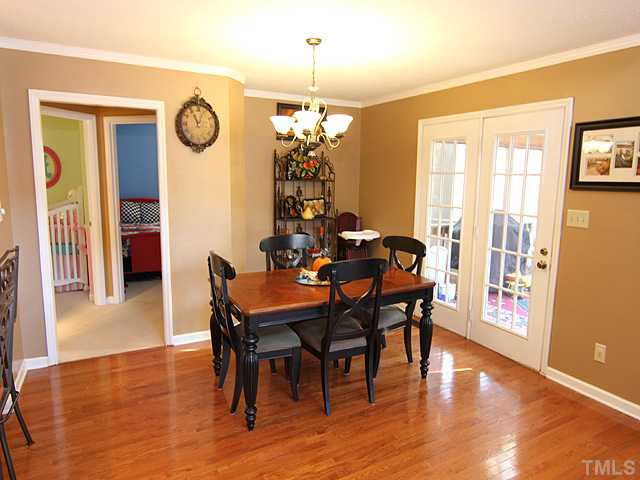 2016 Osbourne Court Raleigh, NC 27604 - Photo 4 of 15 DINING ROOM HAS ACCESS TO SCREENED PORCH.
