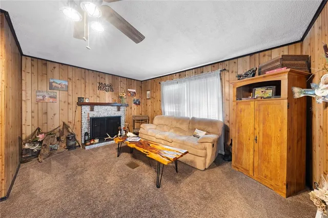 a bedroom with furniture and a fireplace