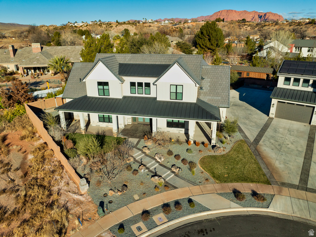 1283 North Gallen Road Santa Clara, UT 84765 - Photo 95 of 103 View of front of home with a porch, a mountain view, a standing seam roof, and concrete driveway