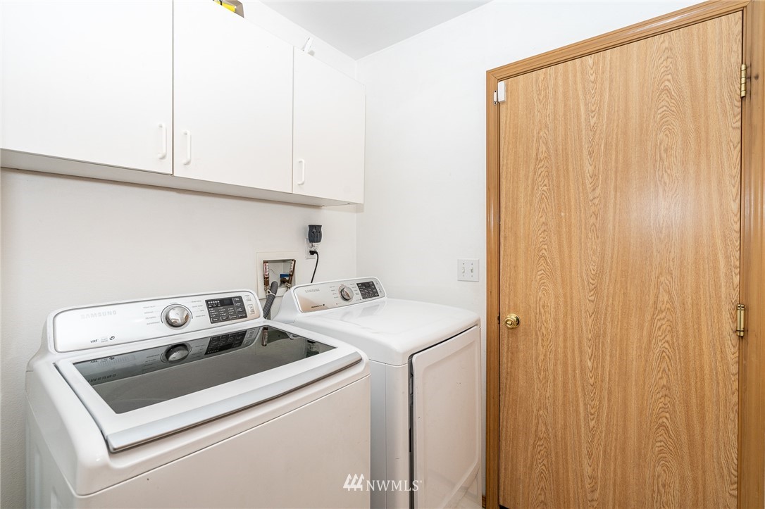 18036 Daryl Lane Southwest Rochester, WA 98579 - Photo 12 of 40 a utility room with dryer and washer