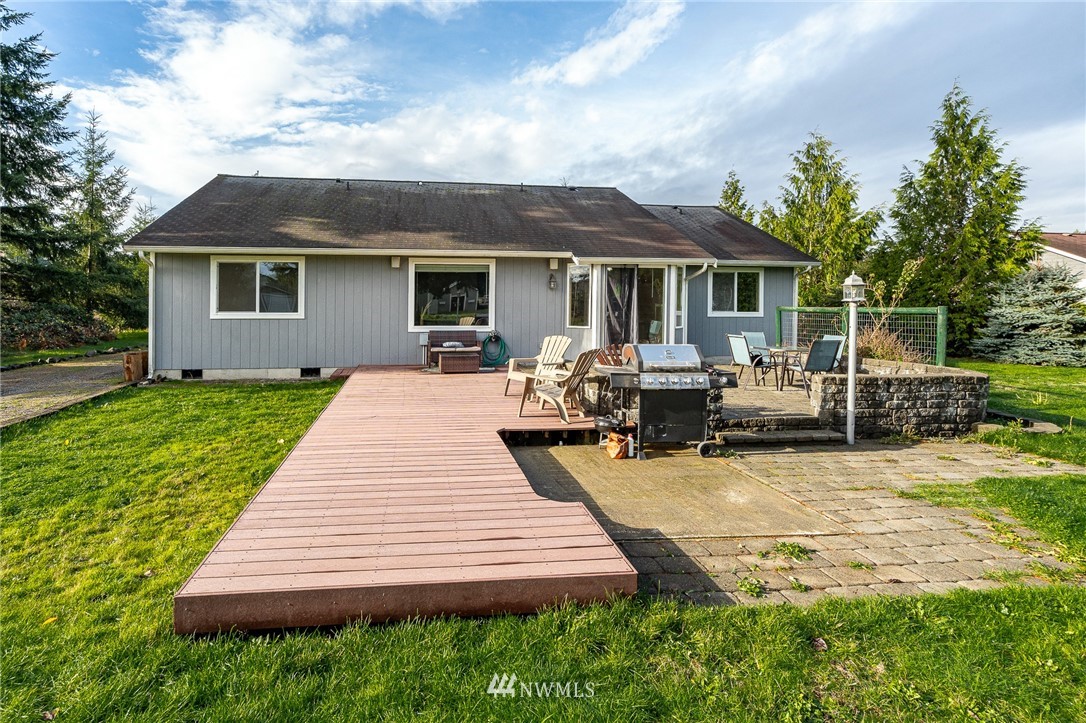 18036 Daryl Lane Southwest Rochester, WA 98579 - Photo 27 of 40 a front view of a house with yard and green space
