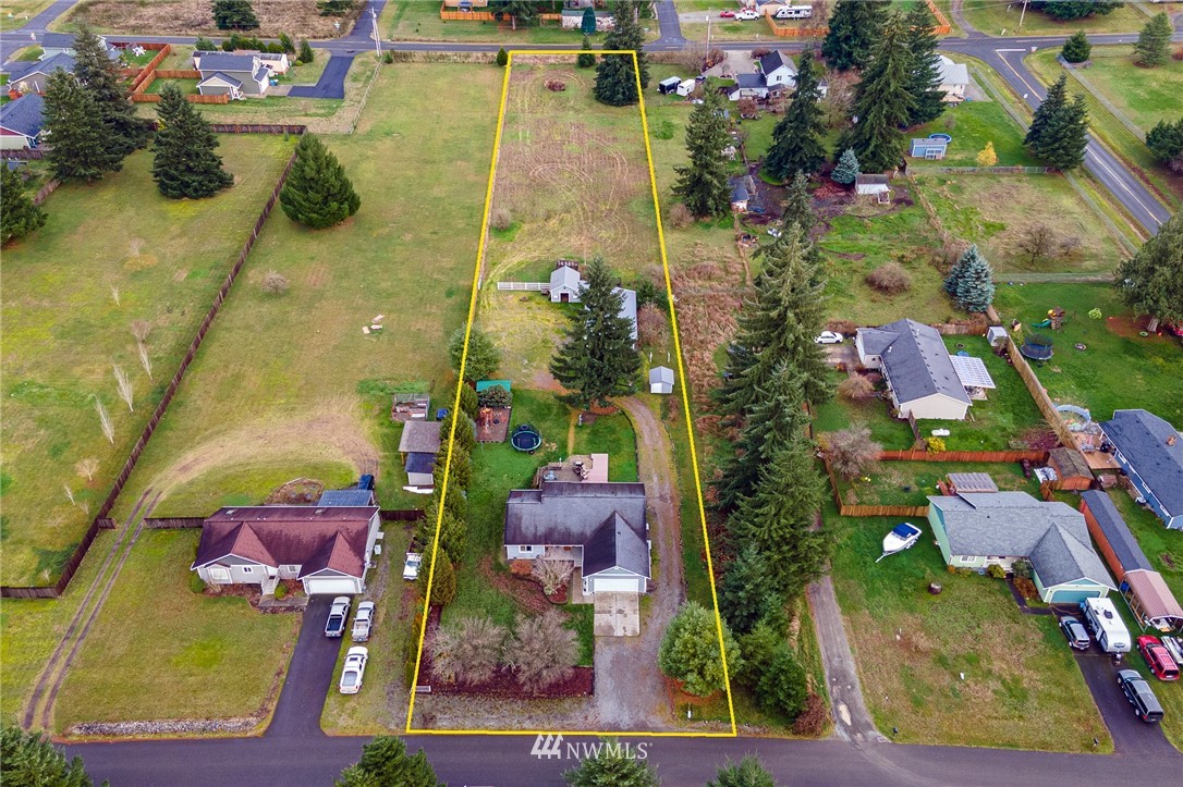 18036 Daryl Lane Southwest Rochester, WA 98579 - Photo 4 of 40 an aerial view of residential houses with outdoor space