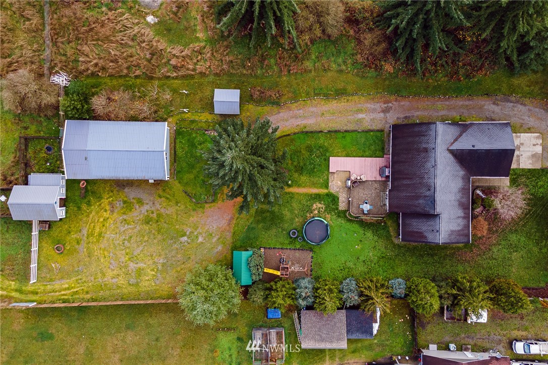18036 Daryl Lane Southwest Rochester, WA 98579 - Photo 39 of 40 an aerial view of a house with a garden