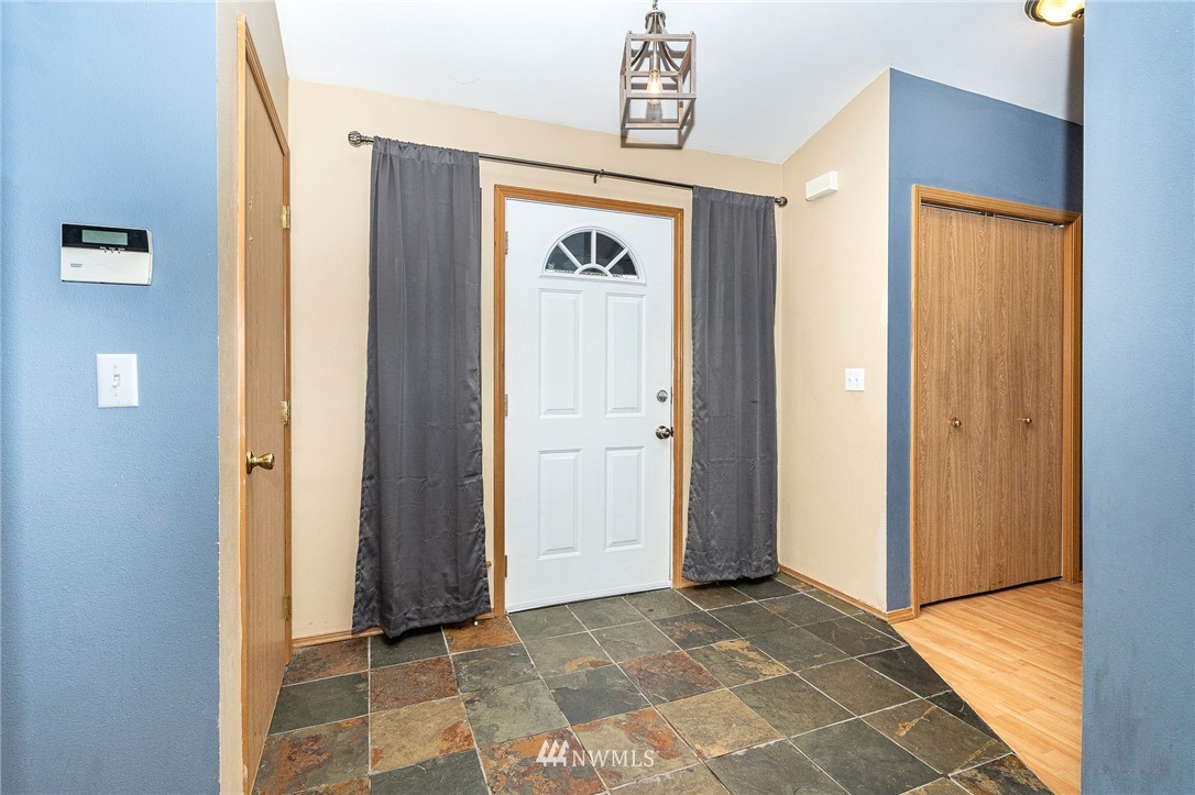18036 Daryl Lane Southwest Rochester, WA 98579 - Photo 7 of 40 a view of a hallway with elevator