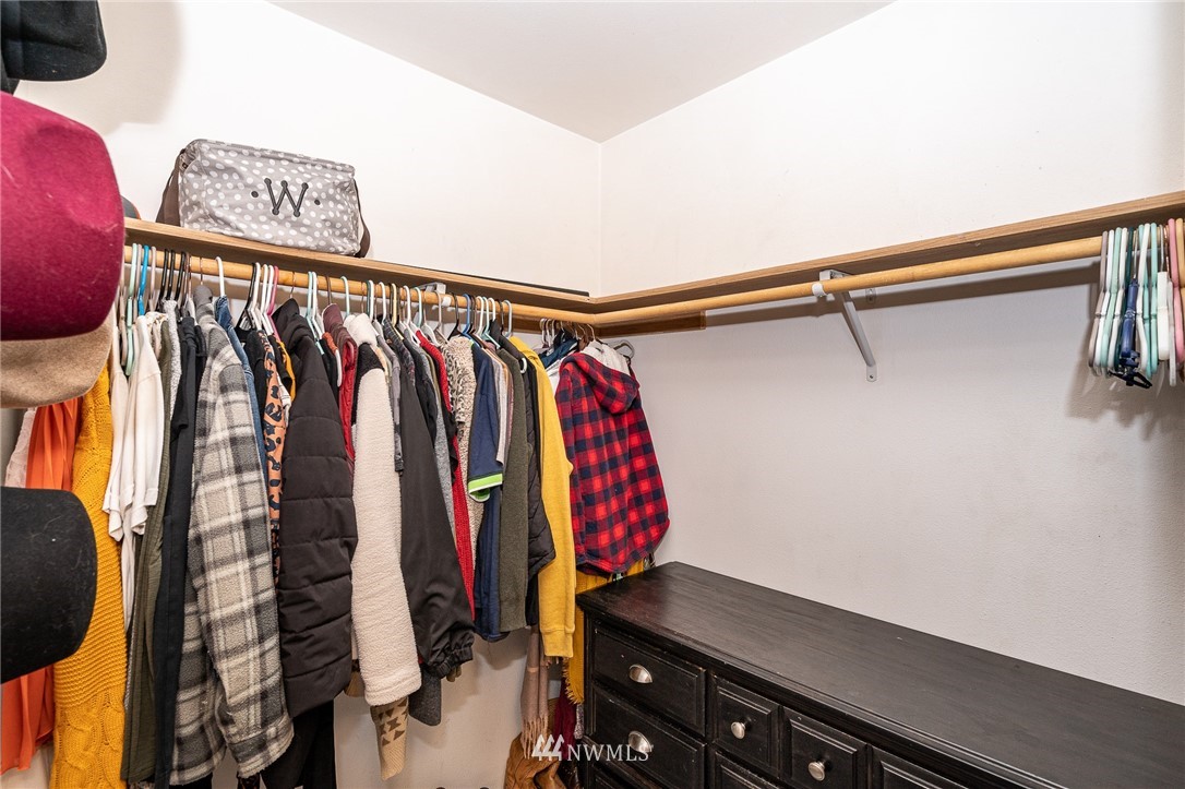 18036 Daryl Lane Southwest Rochester, WA 98579 - Photo 10 of 40 a view of walk in closet with clothes and shoes