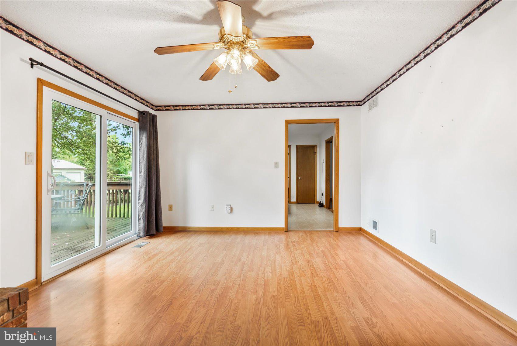 7909 Poplar Grove Road Severn, MD 21144 - Photo 13 of 39 Family room fireplace