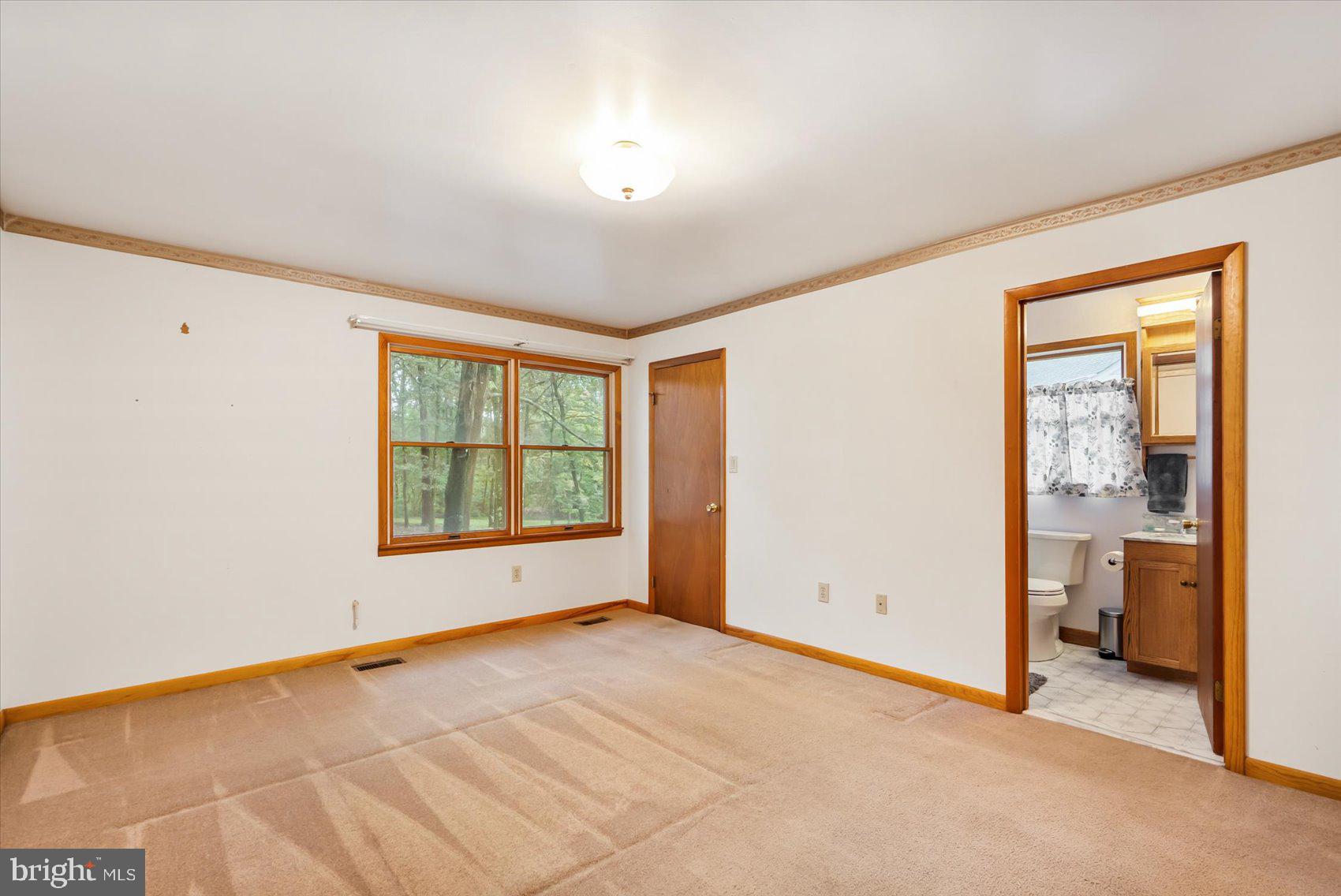 7909 Poplar Grove Road Severn, MD 21144 - Photo 14 of 39 Primary Bedroom / Bathroom
