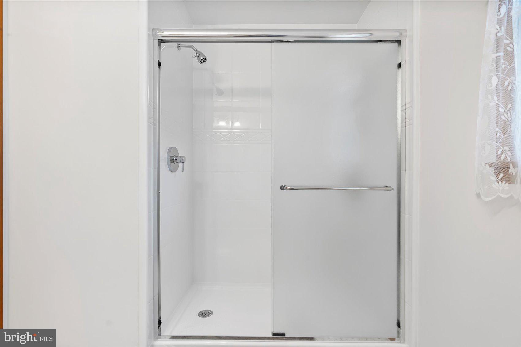 7909 Poplar Grove Road Severn, MD 21144 - Photo 16 of 39 recently renovated primary bathroom