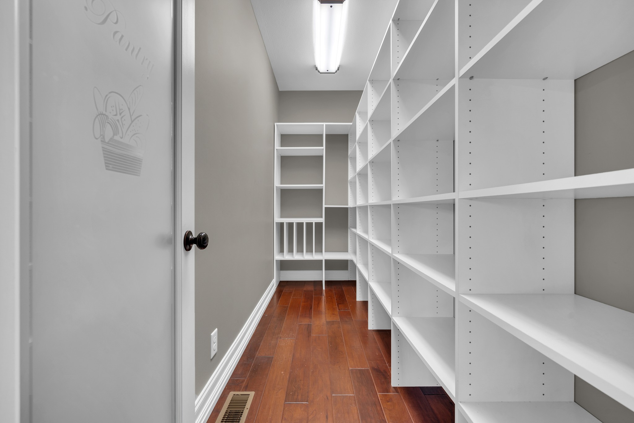 254 Gray Hawk Trail Clarksville, TN 37043 - Photo 12 of 29 a view of a hallway with wooden floor and entryway