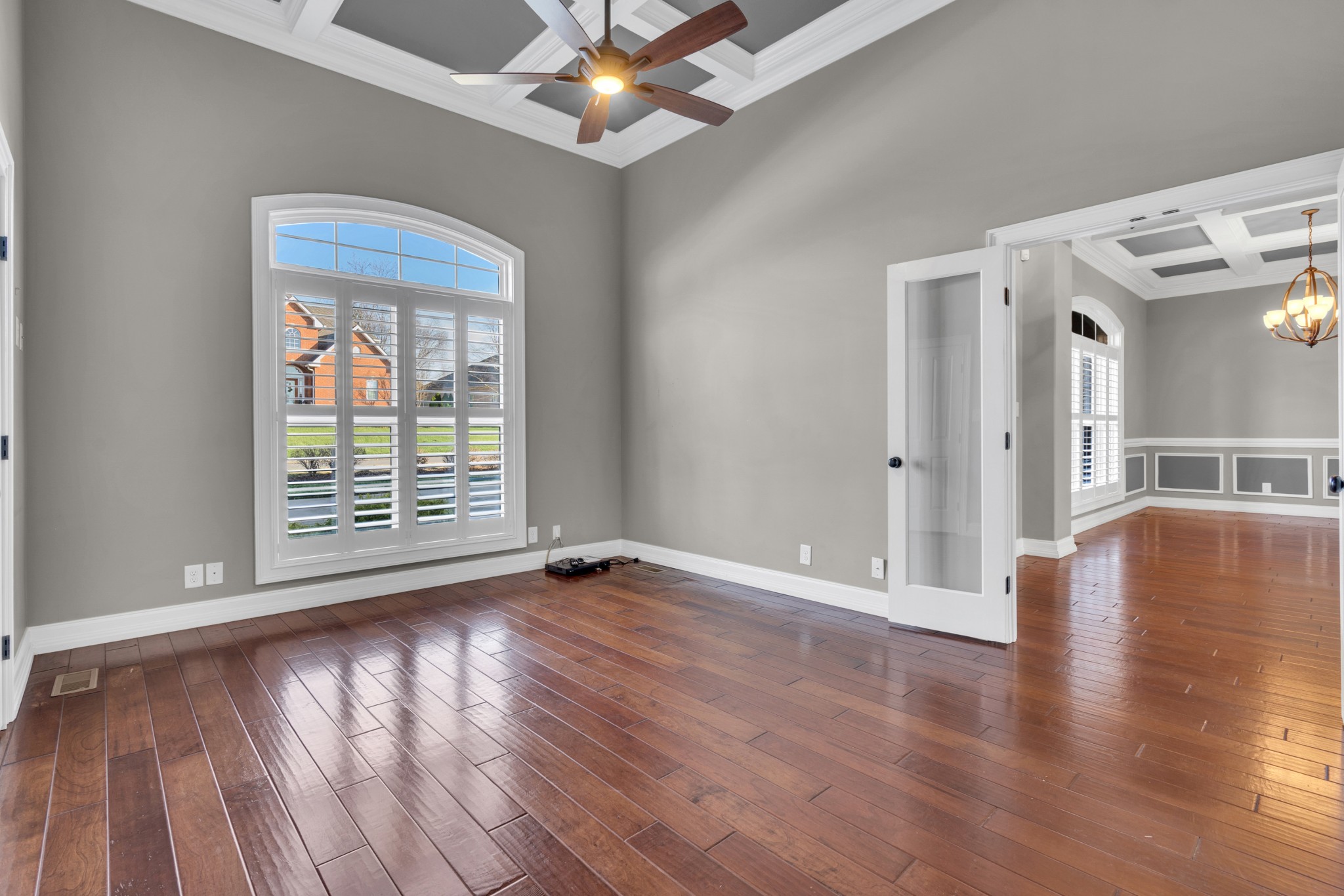 254 Gray Hawk Trail Clarksville, TN 37043 - Photo 13 of 29 a view of an empty room with wooden floor and a window