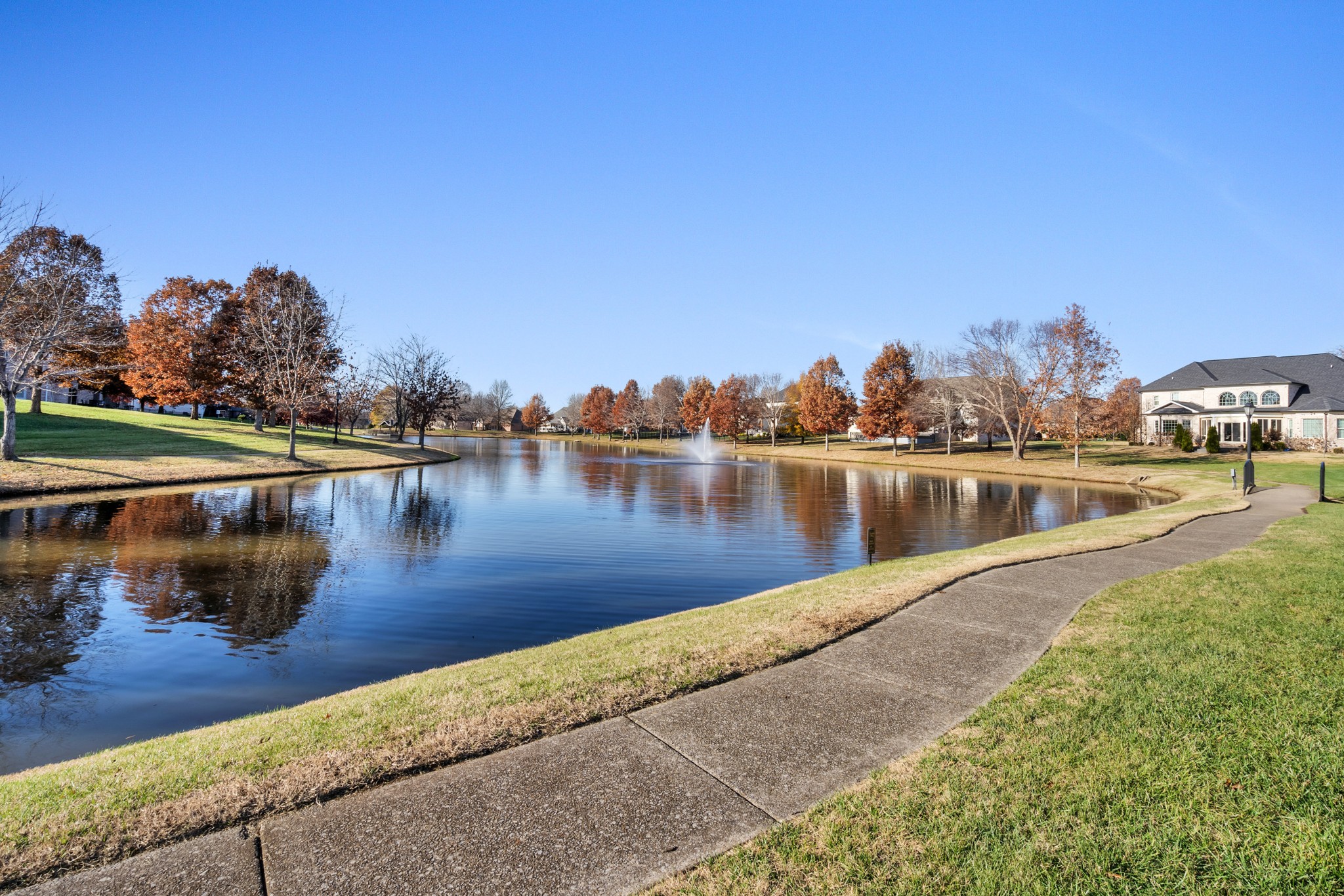 254 Gray Hawk Trail Clarksville, TN 37043 - Photo 29 of 29 a view of a lake with boats and trees in the background